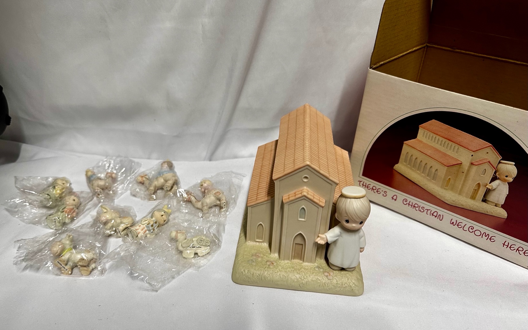 Collectible Precious Moments Theres a Christian Welcome Here Chapel figurine plus nativity figurines