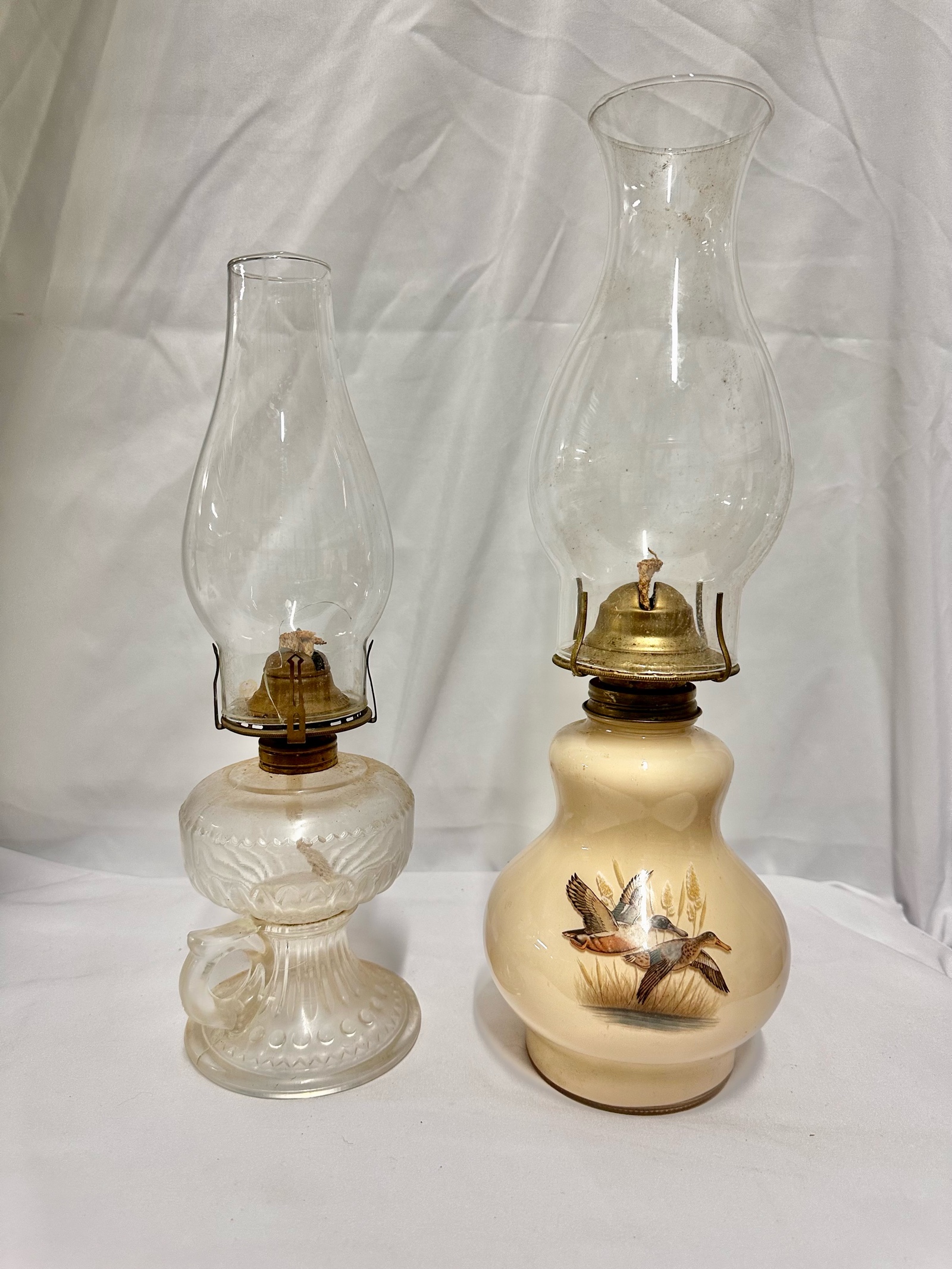 Two vintage Lamplight Farms oil lamps