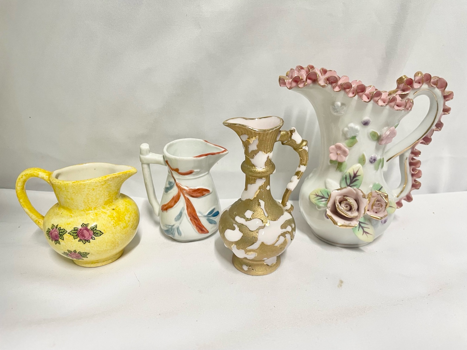 4 Vintage Porcelain Pitchers