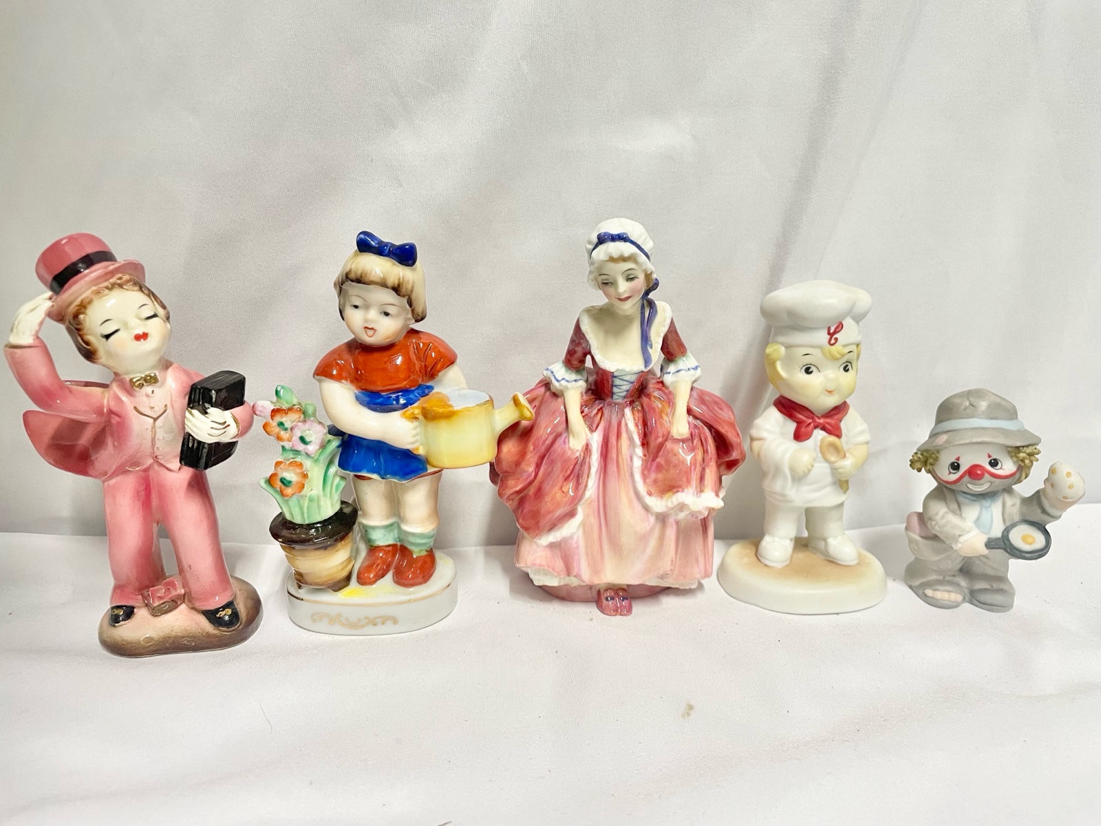 Collectible Royal Doulton Goody Two Shoes (HN 2037) and matching figurines