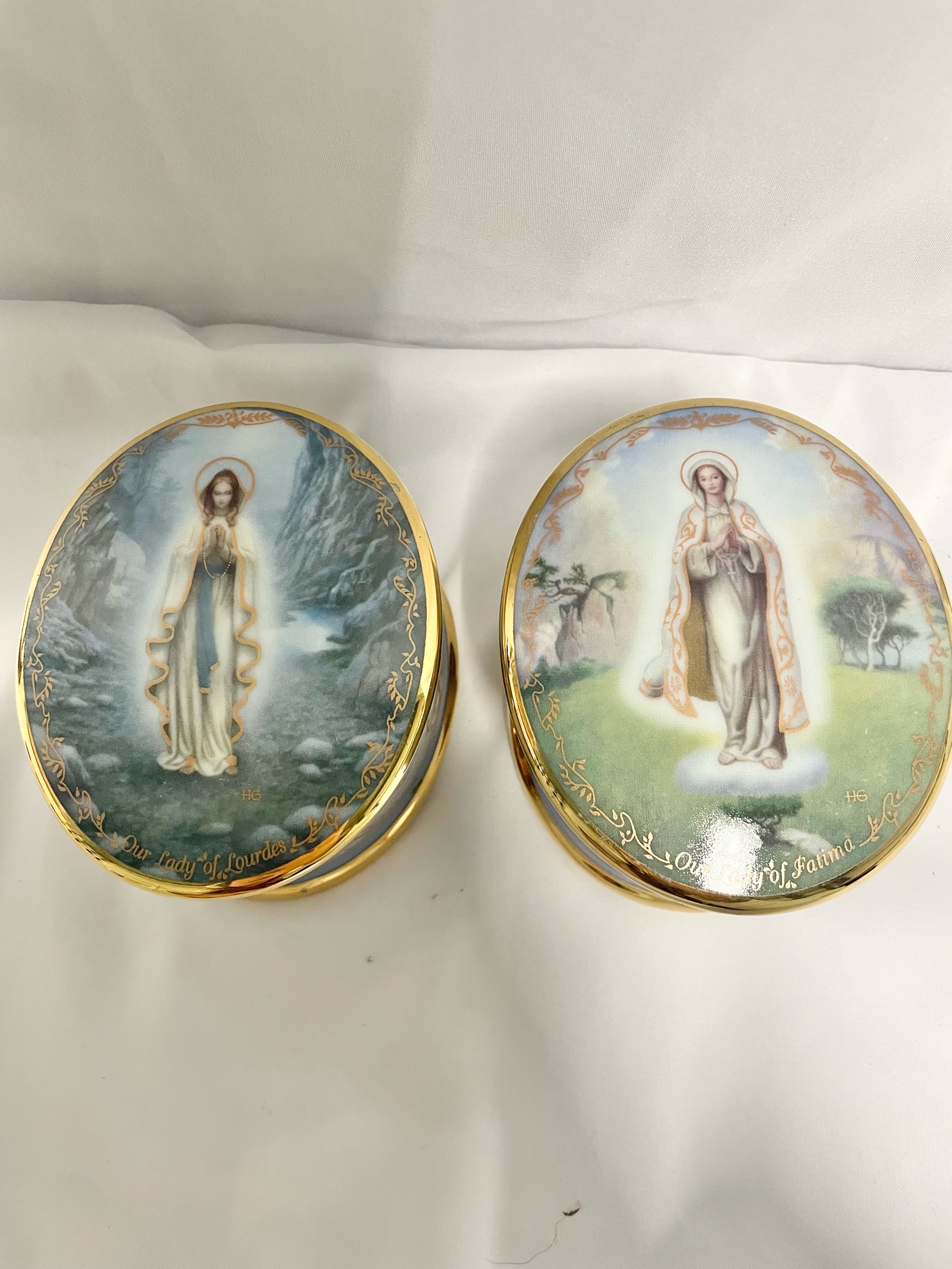 Ardleigh Elliott Visions of Our Lady porcelain music boxes.