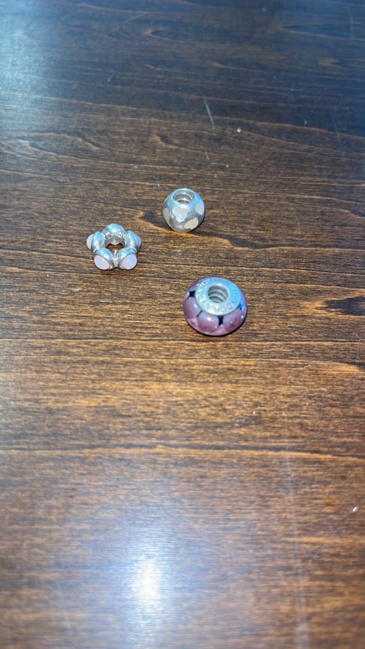 lot 18 image: 3 Retired Pandora 925 Ale Sterling Silver charms