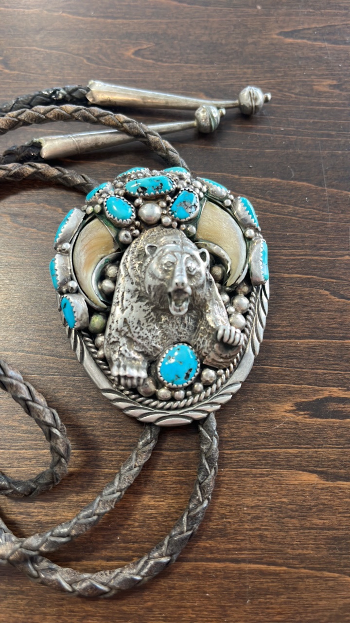 Sterling Hand Made Bolo tie with turquoise and bear claws!