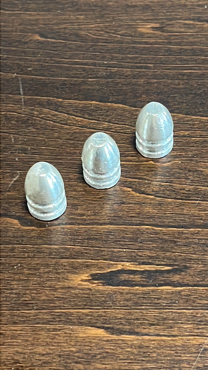 lot 31 image: Pure Silver 999 fine .45 caliber bullets