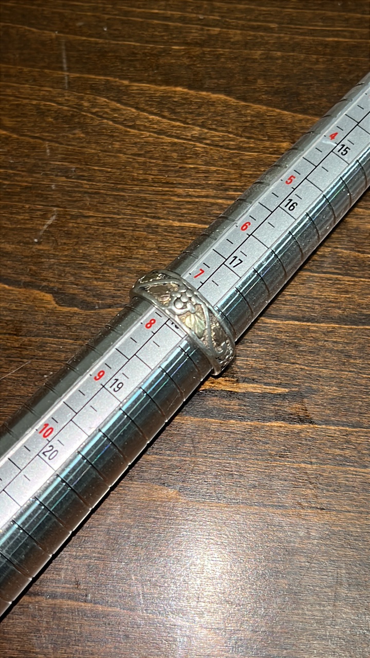 lot 45 image: Black Hills Gold and Sterling Size 8 Ring