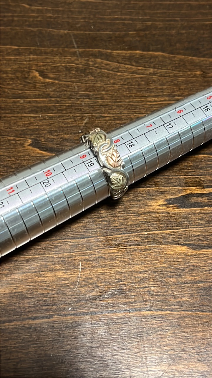 lot 46 image: Black Hills Gold and Sterling Ring size 8.5