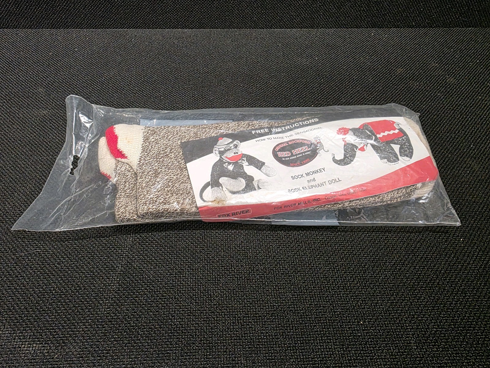 lot 117 image: Two Pair of the Original Rockford Red Heel Socks (Perfectly wearable, but also Sock Monkey socks)