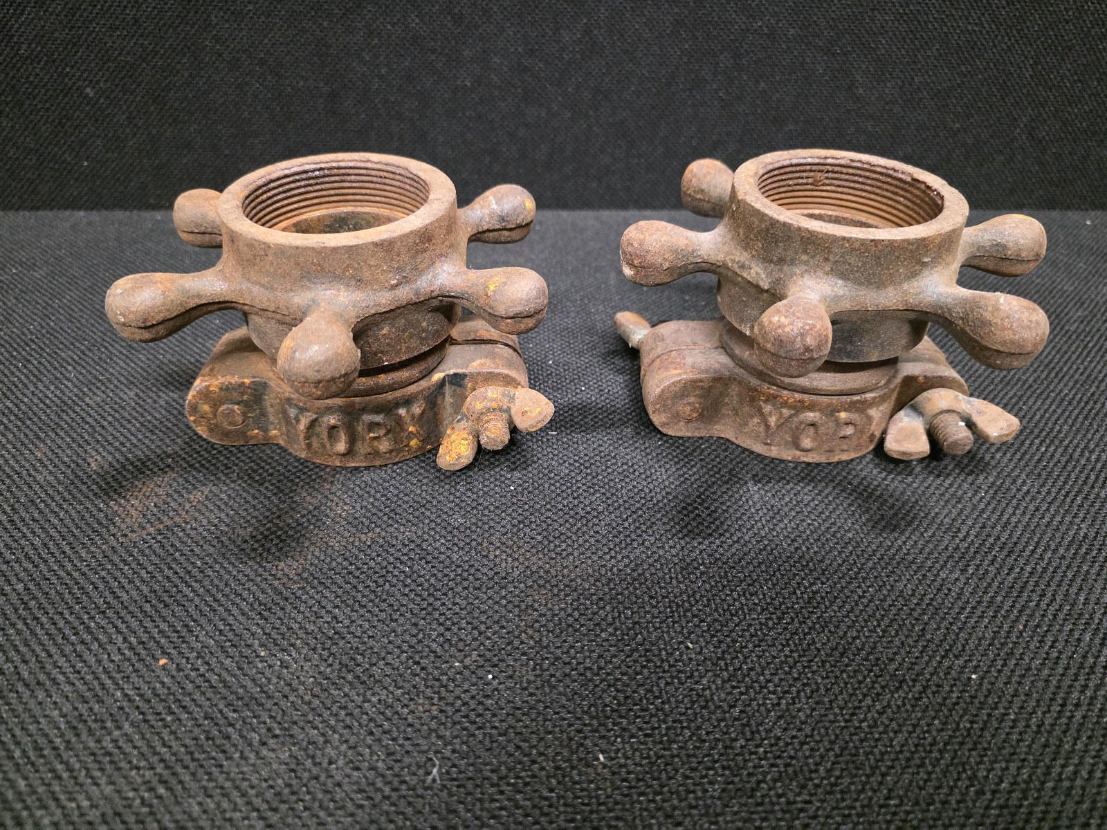 lot 125 image: York Barbell ship wheel spinlock barbell collars