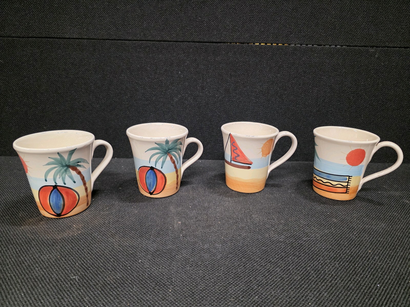 lot 132 image: Four Collectible PIER 1 Ceramic Mugs, Made in Italy, Hand-Painted with a Beach Theme