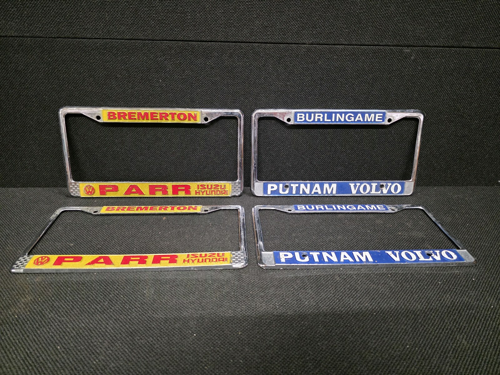 lot 137 image: Vintage Chrome License Plate Frames ( VOLVO and ISUZU  HYUNDAI )