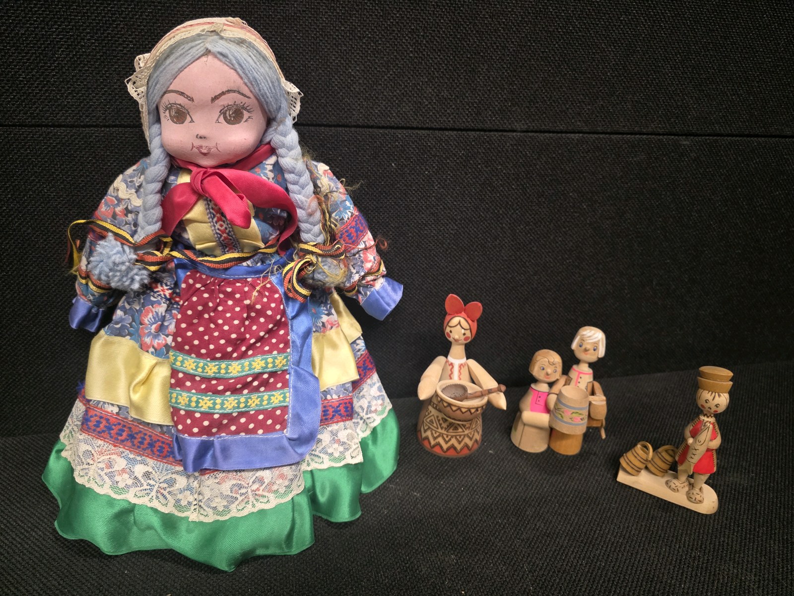 lot 168 image: Vintage Russian (cloth) Rag Doll, and 3 small Hand-Carved Russian Doll Trinkets