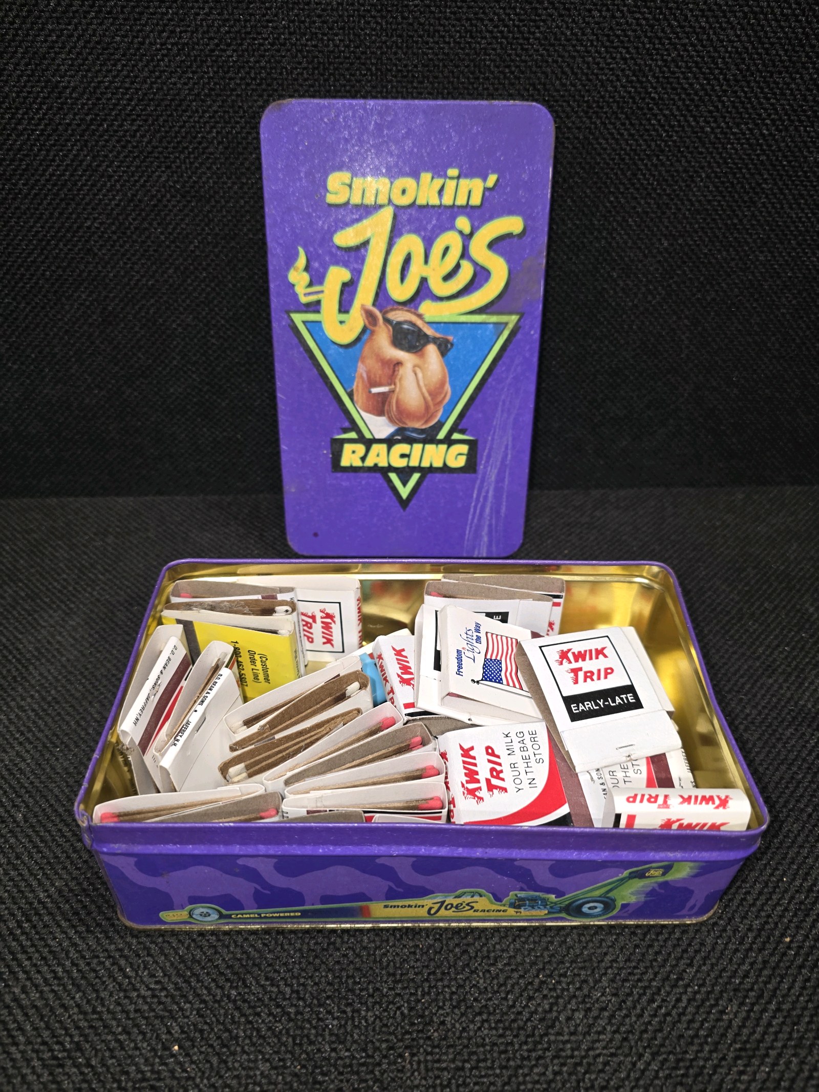 lot 173 image: Vintage 1994 Smokin Joes Racing Tin, full of match-packs