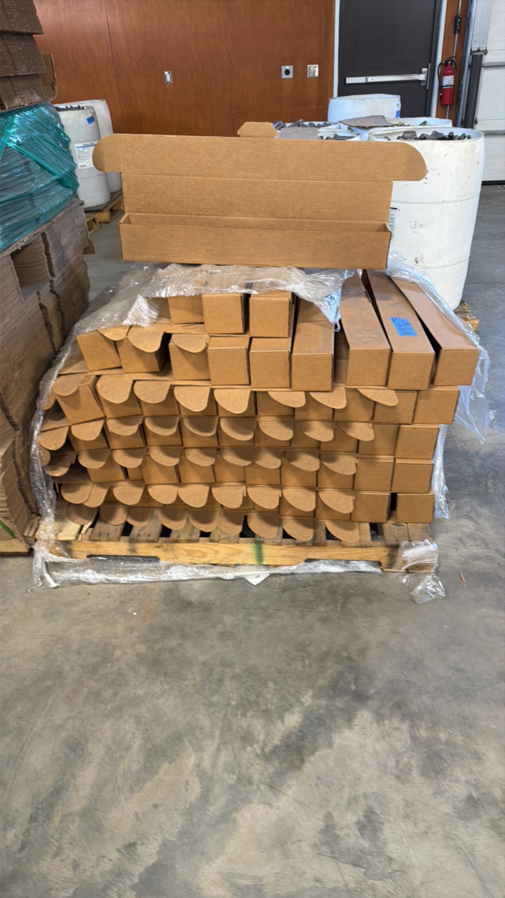 lot 18 image: Pallet of empty Boxes measures 30.75 L x 4  x 4. Quantity approx 53