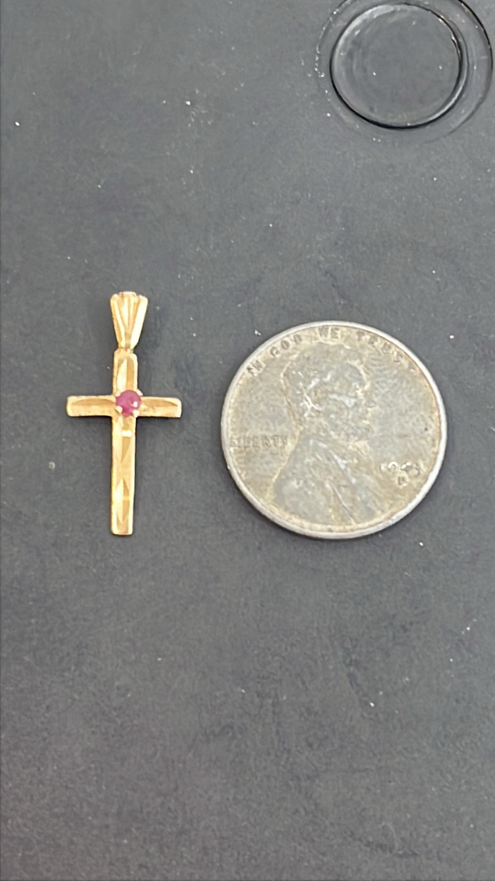 lot 24 image: 14K Gold .47Gram Cross with a Ruby