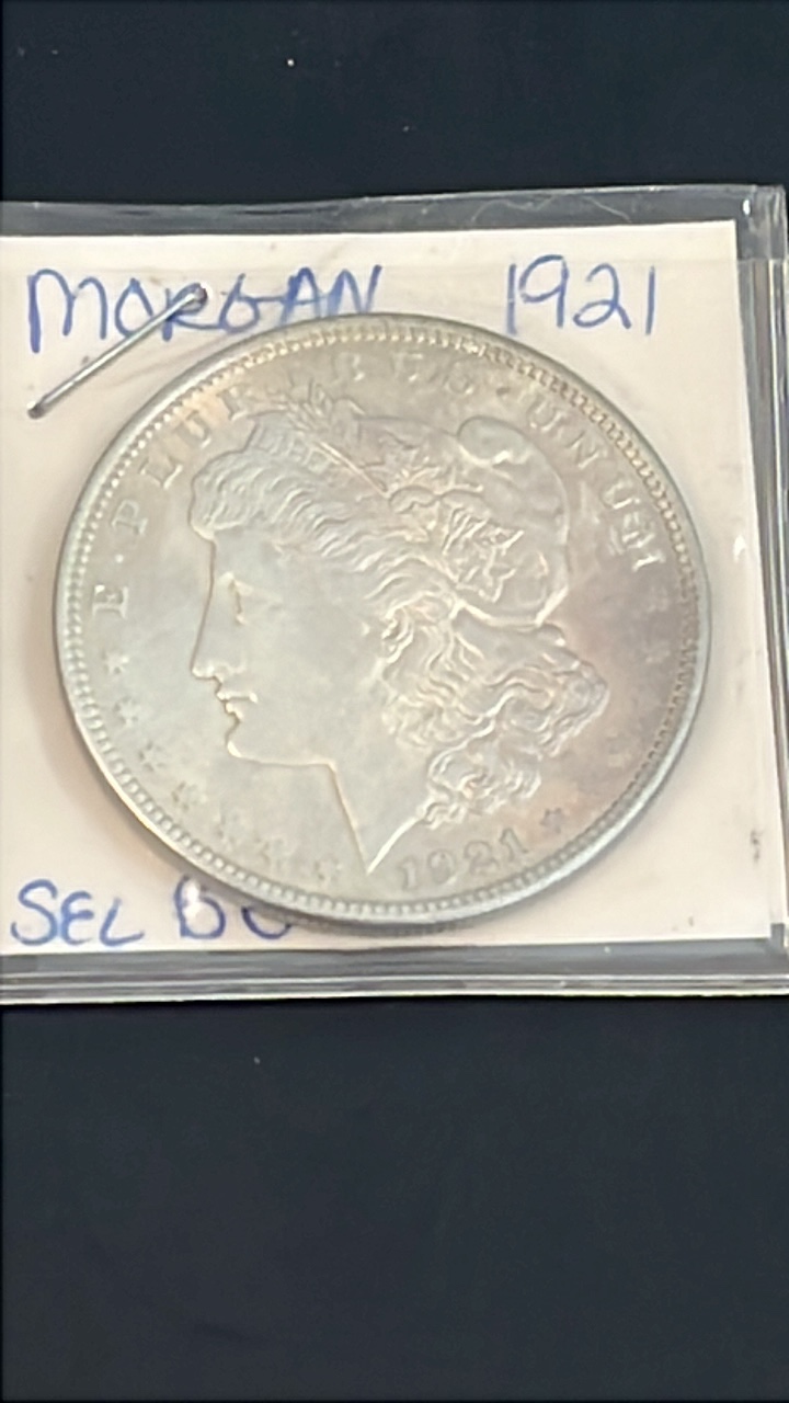 lot 9 image: Uncirculated 1921 Silver Morgan
