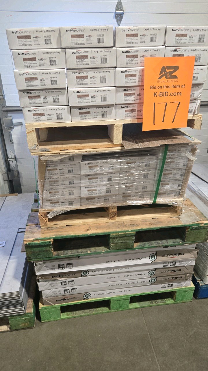 lot 177 image: TrafficMaster Khaki Oak 4 MIL x 6 in. W x 36 in. L Grip Strip Water Resistant Luxury Vinyl Plank Flooring (1752 sqft)