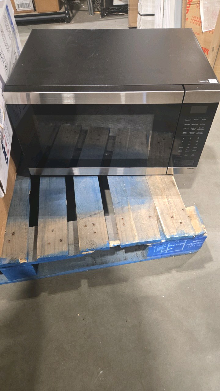 lot 38 image: Samsung 1.9 cu. ft. 900 W Countertop Microwave in Stainless Steel with Sensor Cook