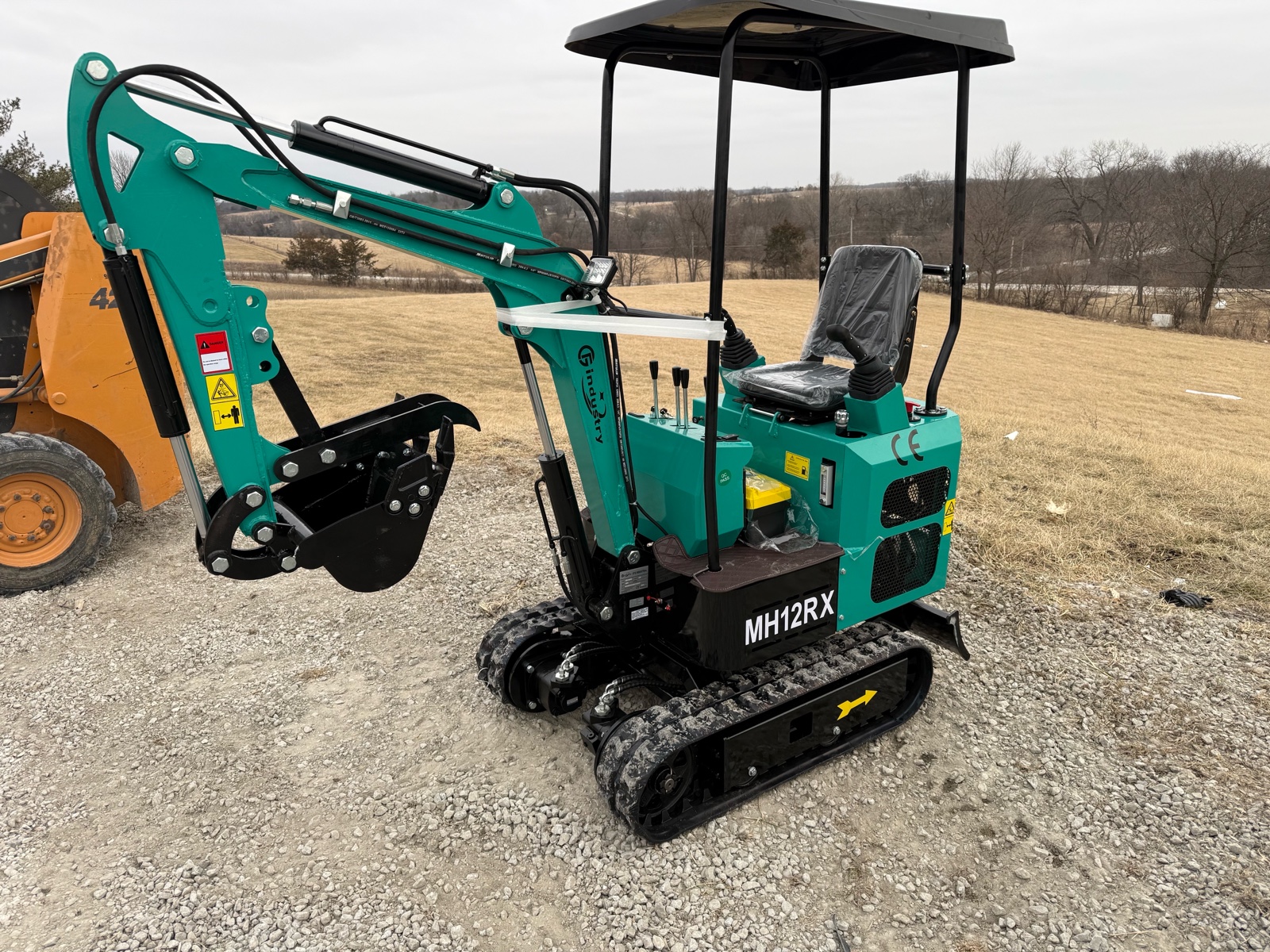 lot 2104 image: MH12RX MINI EXCAVATOR