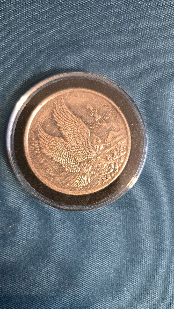 lot 16 image: 1 OZ. PURE SILVER MEXICAN  COIN