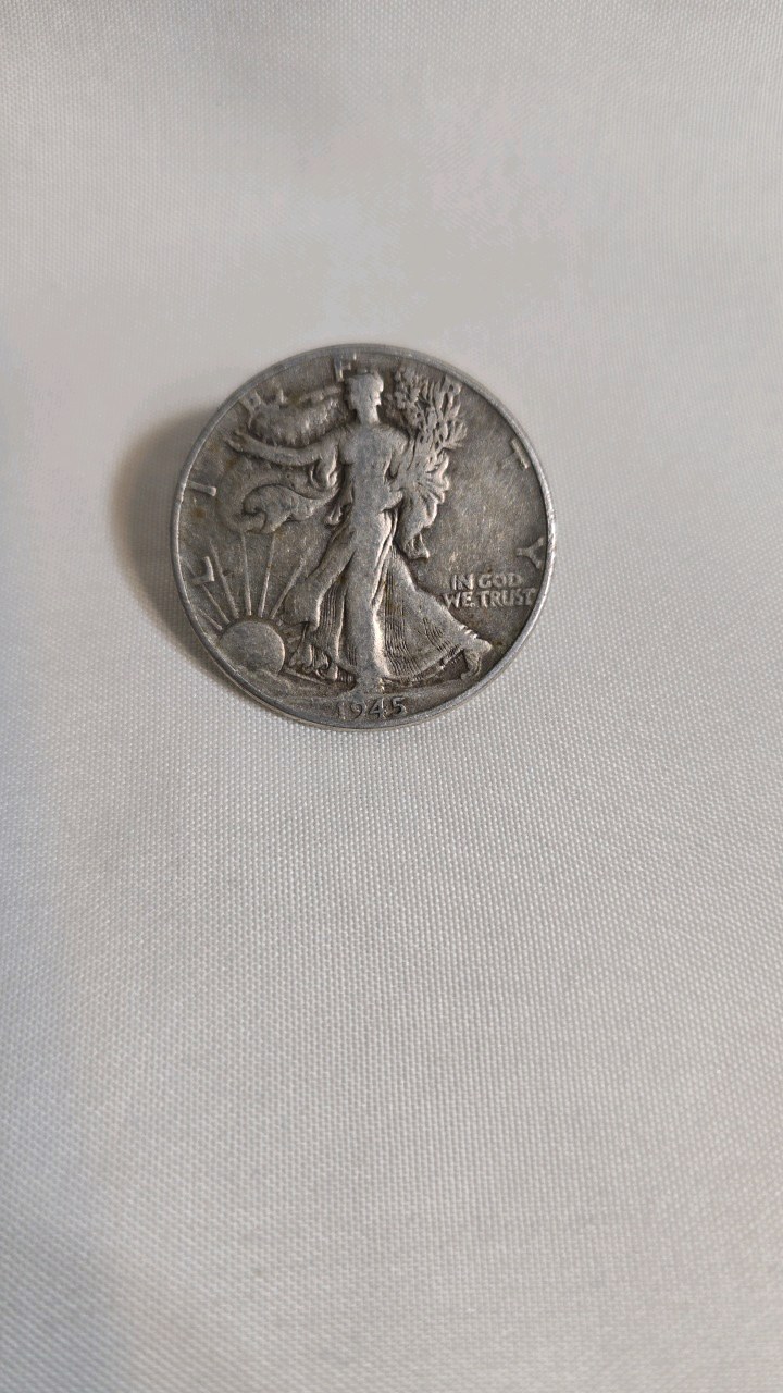 lot 36 image: 1945 WALKING LIBERTY HALF DOLLAR