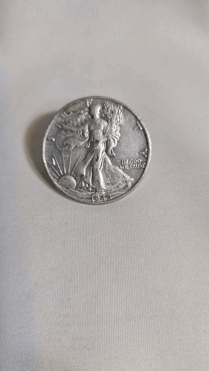 lot 38 image: 1942 WALKING LIBERTY HALF DOLLAR