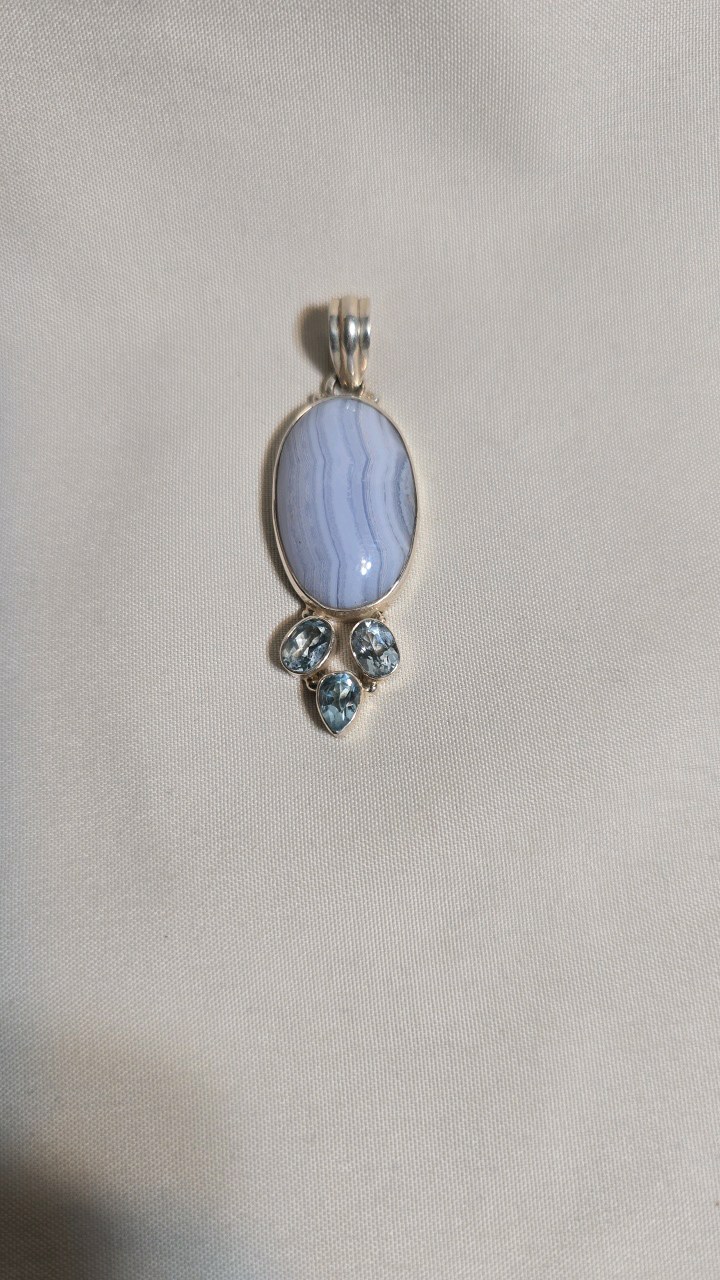 lot 43 image: STERLING SILVER PENDANT