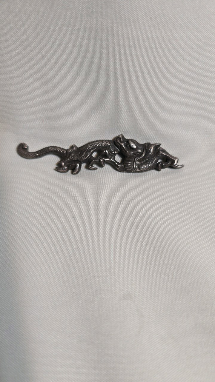 lot 45 image: STERLING SILVER MENUKI