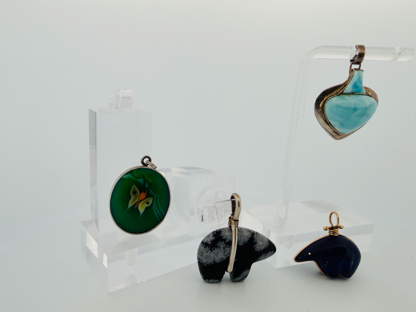 lot 115 image: (4) STERLING or semi-precious stone Pendants