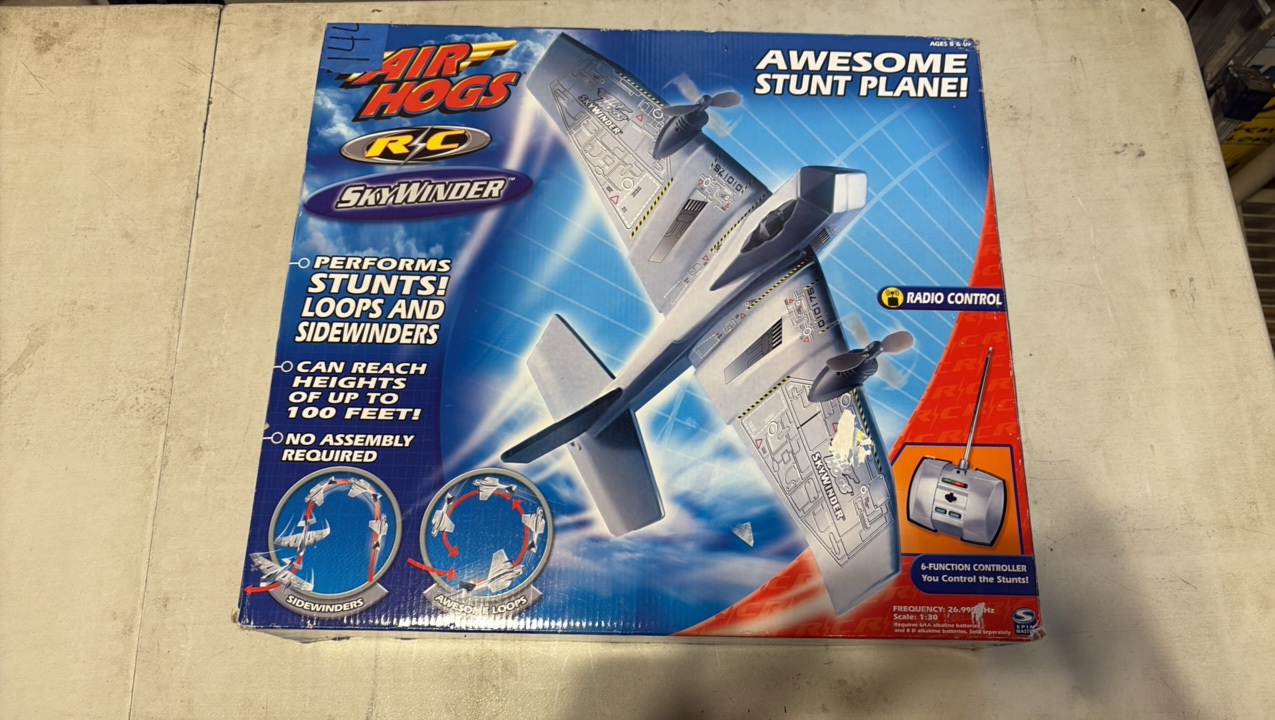 lot 144 image: AIR hogs Stunt Plane,  RC skywinder stunt plane