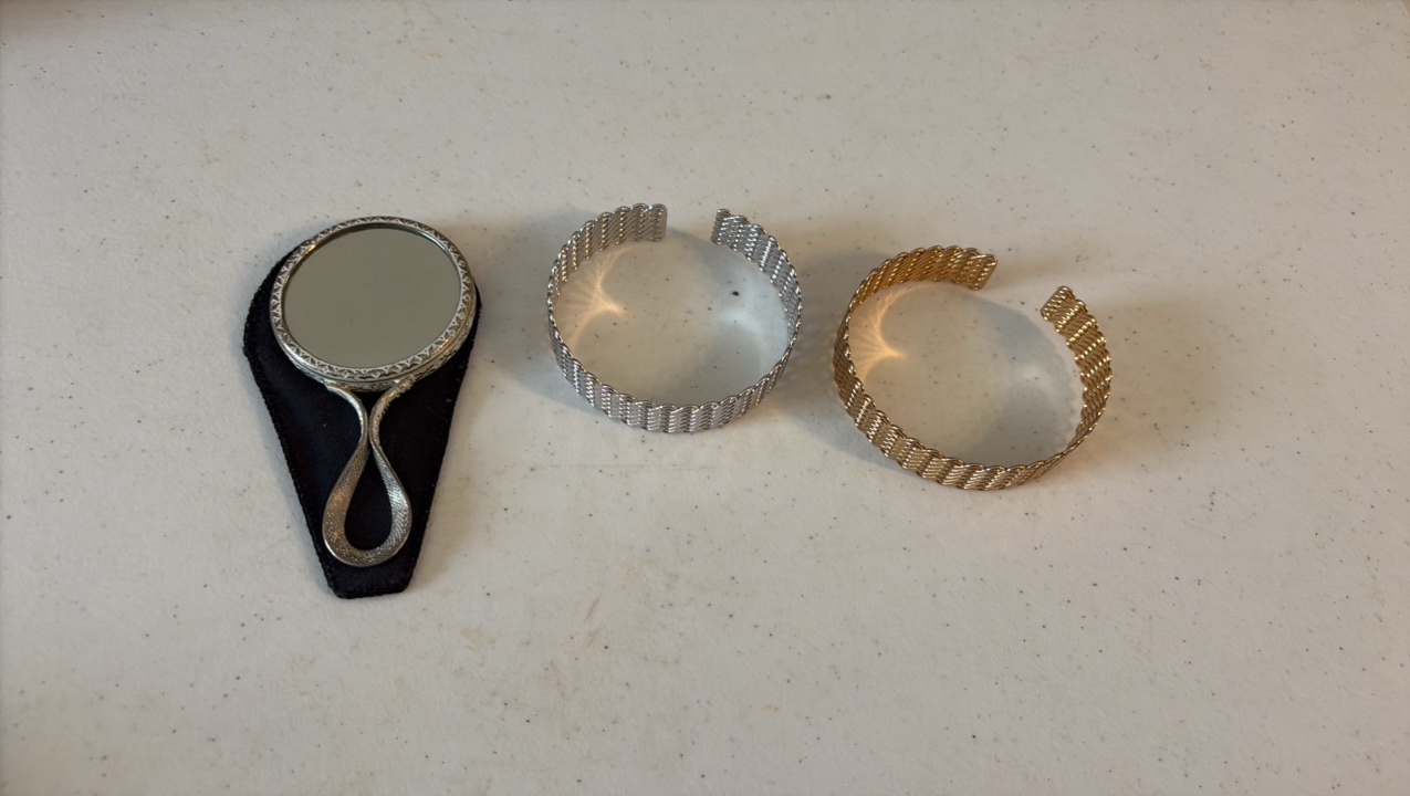 lot 153 image: (2) NAPIER bracelets and a vintage hand mirror