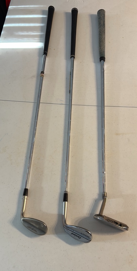 lot 17 image: (3) GOLF clubs Titleist, Cleveland RTX 6, and Great White Tiger Shark GW-4