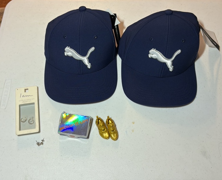 lot 34 image: (2) PUMA hats (2)earring sets(one.925 Sterling) Mini Reebok shoes