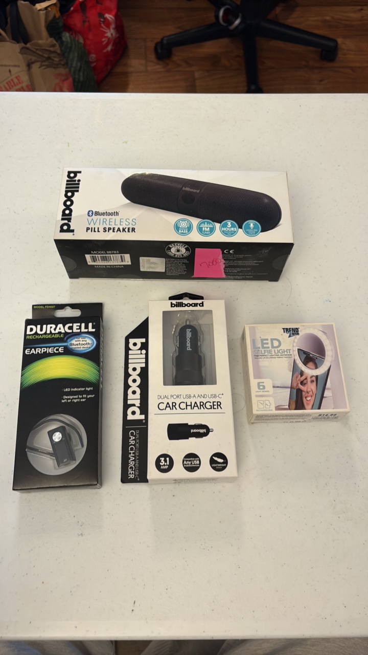 lot 79 image: DURACELL Bluetooth ear piece, Billboard car charger, Trend LED selfie light, wireless pill speaker