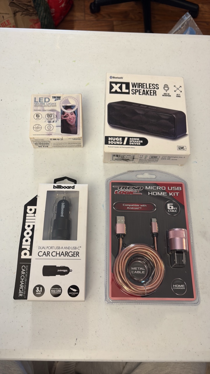 lot 82 image: BLUETOOTH XL wireless speaker, Trend Micro USB Home Kit and LED selfie light, Billboard Car Charger