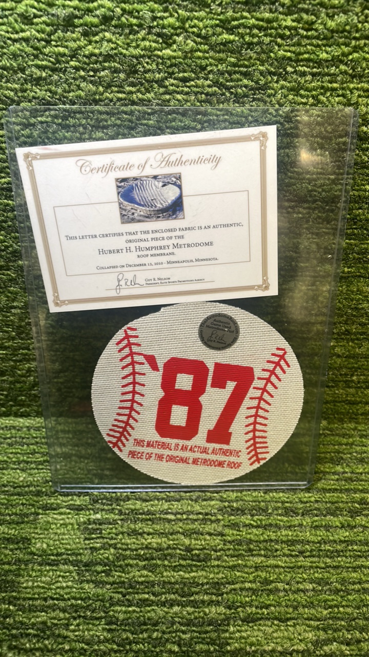 lot 11 image: Hubert H Humphrey Metrodome- Piece of original ROOF with authenticity