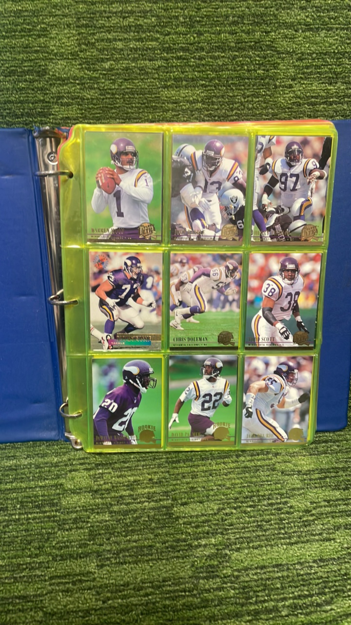 lot 197 image: Binder of over 100 Vikings, Green Bay, Dallas, and more