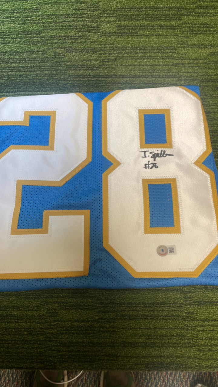 lot 20 image: Los Angeles Chargers, Isaiah Spiller autographed jersey #28