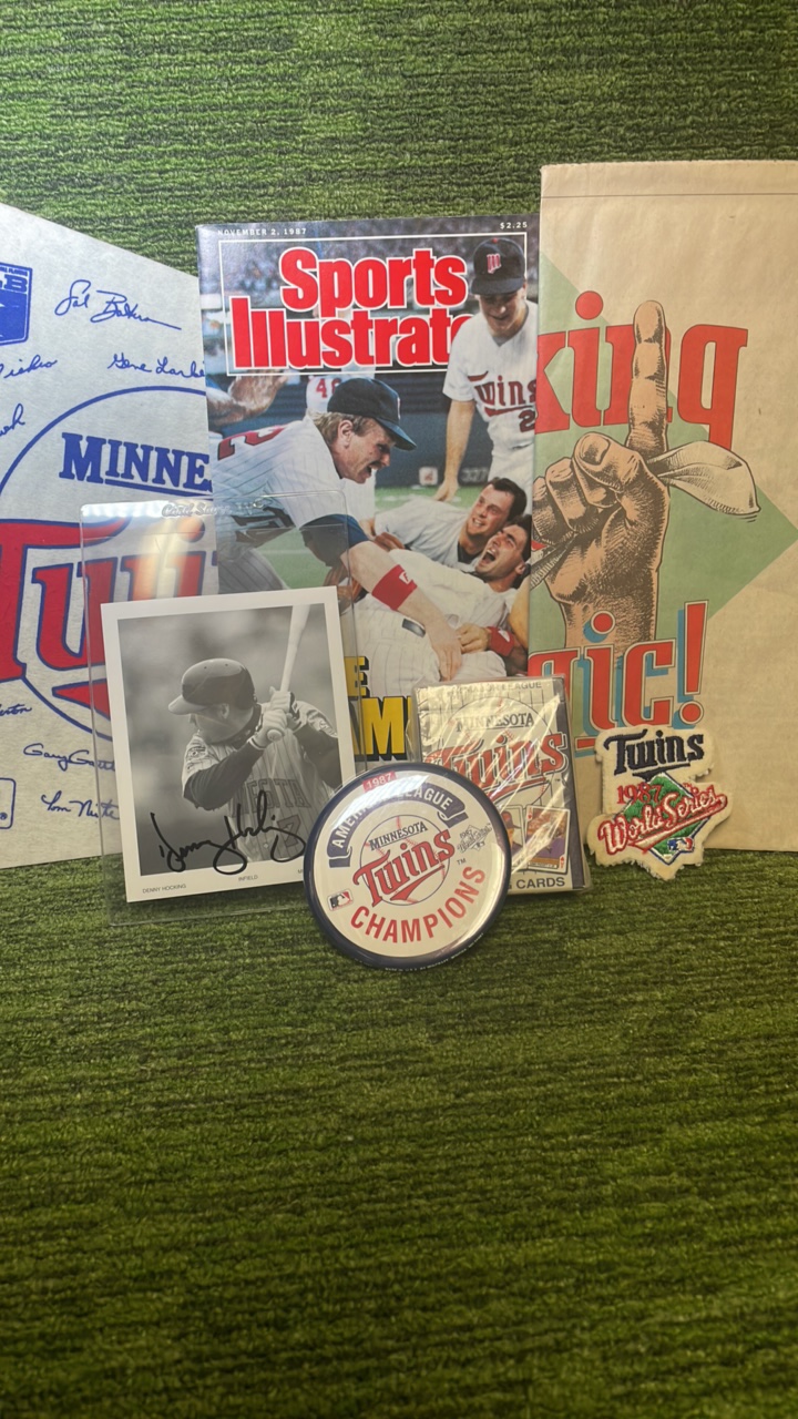 lot 218 image: Minnesota Twins mixed fan memorabilia lot pennant Sports Illustrated playing cards button poster patch Denny Hocking autograph
