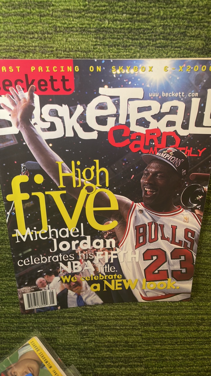 lot 224 image: 1997 August Beckett basketball card monthly Michael Jordan celebrates fifth title