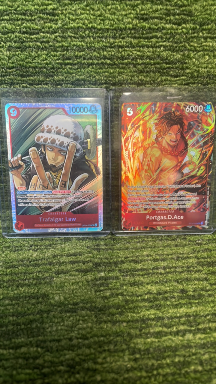 lot 34A image: One Piece Trafalgar Law TCG The Azure seas seven foil, & Portgas.D.Ace (2cards)