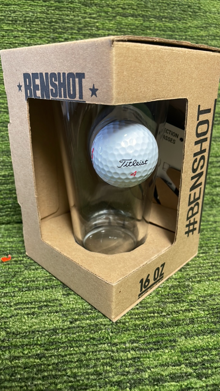 lot 64A image: Benshot 16 ounce glass with embedded golf ball handcrafted in Wisconsin
