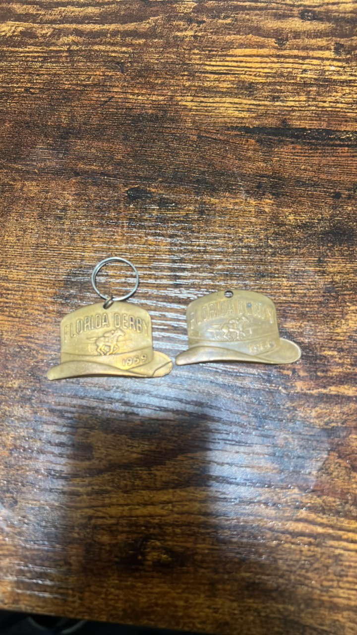 lot 107 image: Florida derby watch fobs 1959-1960