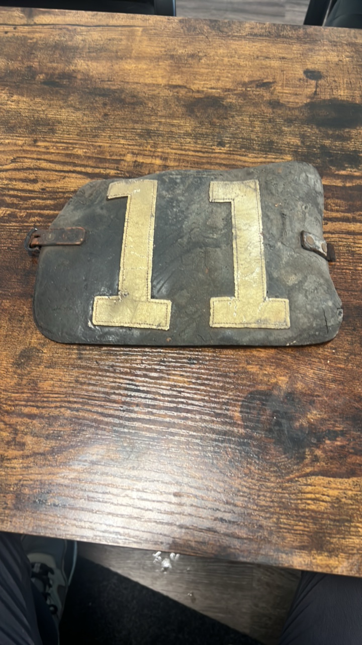 lot 125 image: late 1800s early 1900s leather jockey identification arm band