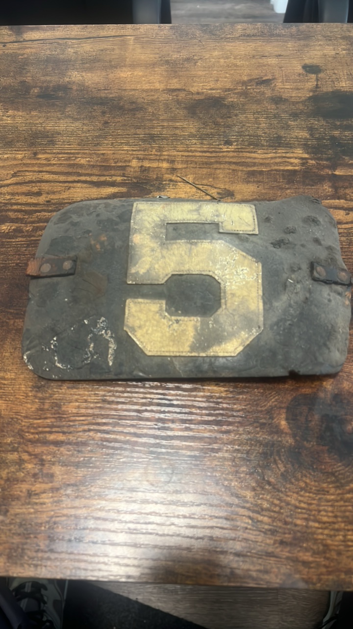 lot 127 image: late 1800s early 1900s leather jockey identification number arm band