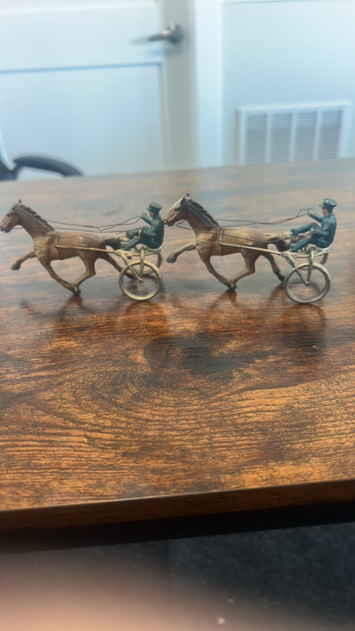 lot 29 image: cast iron horse cart racing figurines