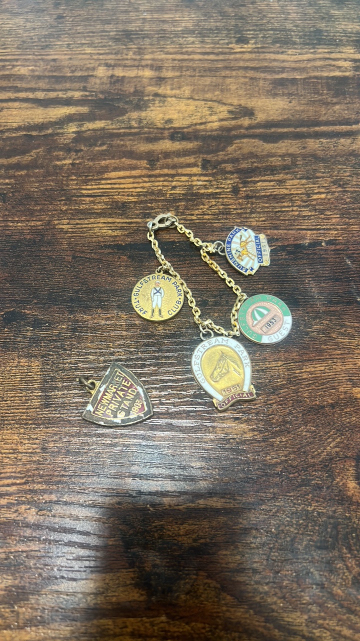 lot 97 image: watch fobs dated 1903-1953