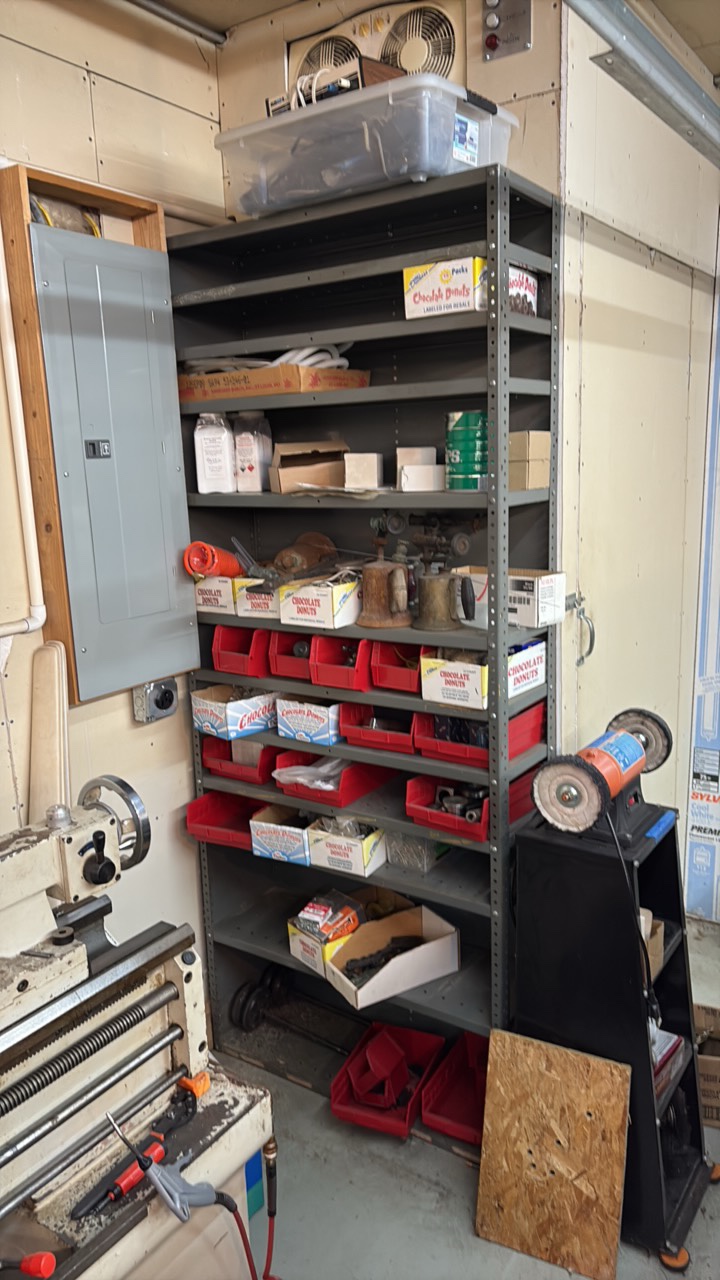 lot 114 image: SHELF Unit full of hardware. Shelf is  H 87 x L 3 x D 1