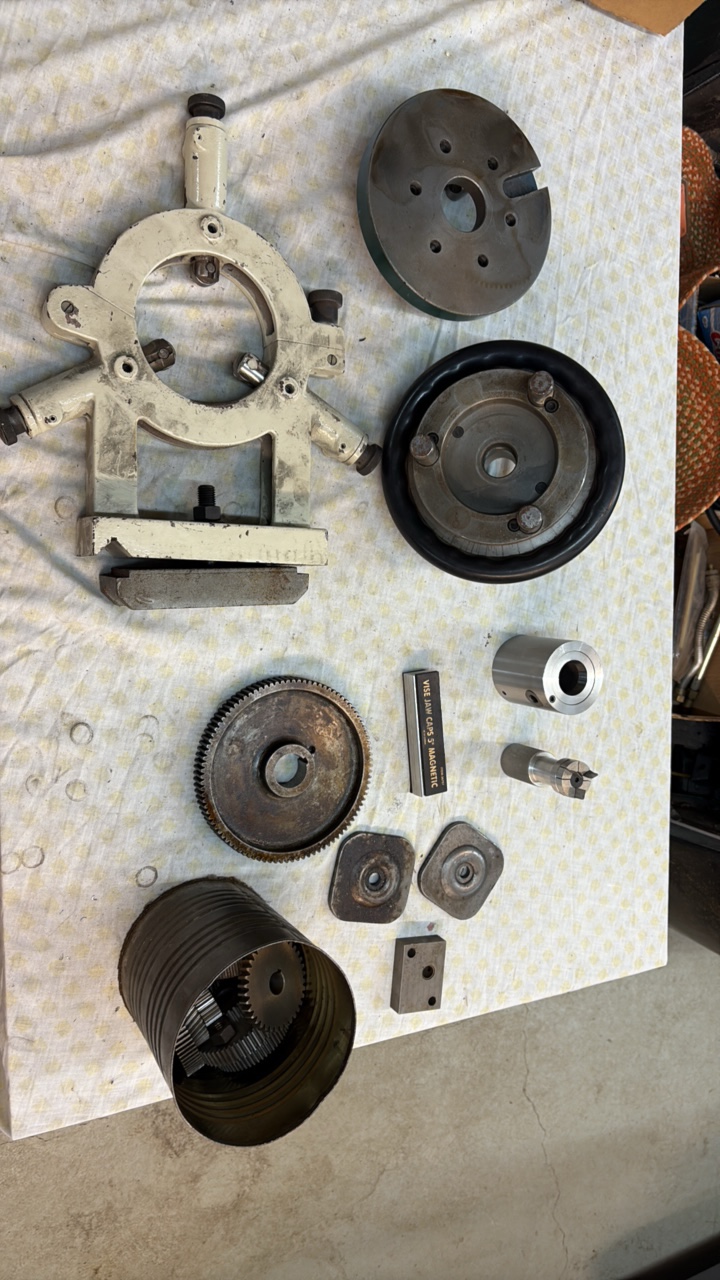 lot 116 image: LATHE steady rest, lathe faceplate, and gears