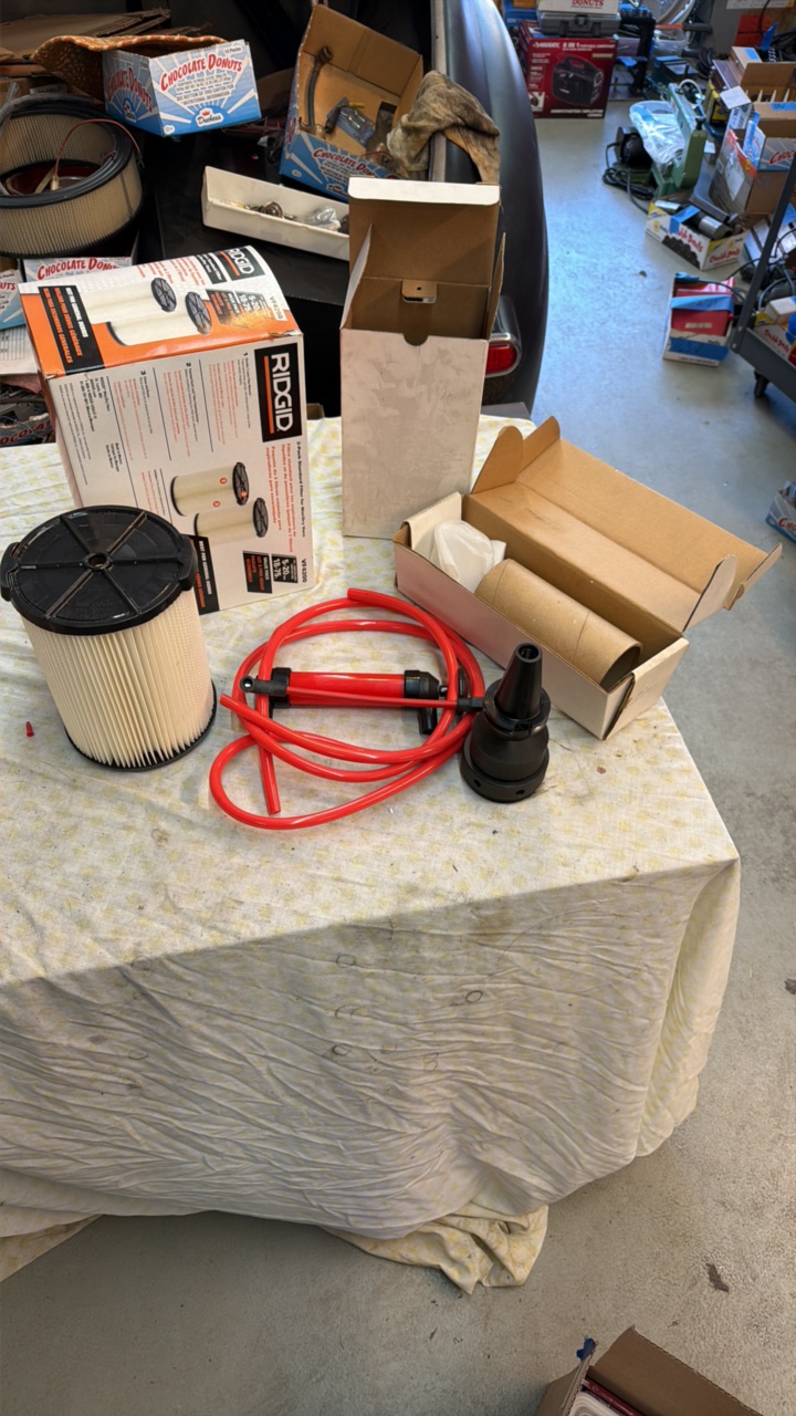 lot 179 image: RIDGID pleated filter, transfer pump, tool holder