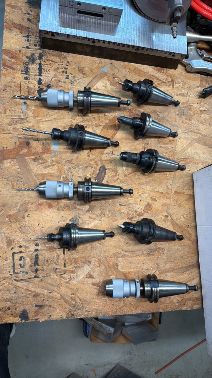 lot 68 image: (9)  ASSORTED Cat-style taper tool holders